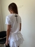 Remera Pima Flamé No Rizz Blanca en internet