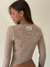 Sweater Tejido Morley Terminación Asimétrica Crema en internet