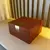 Caixa Quadrada Decorativa em MDF com Couro Sintético Mocca e Detalhe Dourado – 19x8x18cm