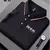 Camisa polo masculina bordada de manga curta casual de negócios, elegante - comprar online