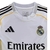 Camisa Real de Madrid I 25/26 - Torcedor Adidas Masculina - Branca com detalhes em cinza e amarelo - loja online