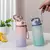 Garrafa de Água 630ml SPACE Com Cordão Tampa Plastico Squeeze Esporte Livre Fi - loja online