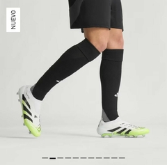 Botines de terreno firme sin cordones Predator absolado Elite en internet