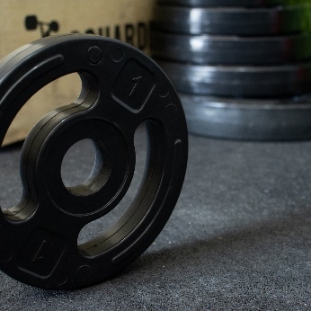 Anilha Vazada Dúctil Injetada c/ Furo Olímpico - 10kg (Ferro e Borracha Inj.)