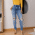 Calça Jeans Skinny Destroyed na internet