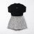 Conjunto Infantil Menina Blusa Preta Gola Alta e Saia Estampada | Poliéster e Elastano Elegante na internet