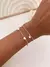 Pulseira Quatro Coracoes Banhada a Prata
