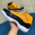 AIR JORDAN 11 ' Black Yellow' - Outlet Importados