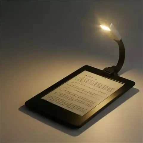 Luz LED para lectura de libros, recargable por USB.