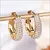 Argolas Femininas Douradas – Design Oco Pavimentado com Toque Glamouroso - comprar online