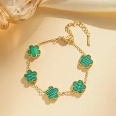 A pulseira dupla face de aço inoxidável com pétalas de cinco folhas e trevos banhados a ouro é o melhor presente de família para mães, meninos na internet