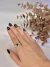 ANEL PERIDOTO LATERAL CRAVEJADA - comprar online