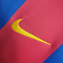 Camisa Retrô Barcelona I 10/11 - Masculina Nike - Azul e vermelha com detalhes em amarelo - EM SPORTS