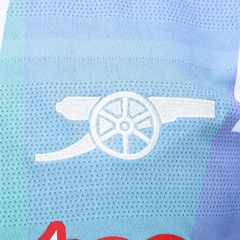 Camisa Arsenal Pré-jogo 24/25 - Torcedor Adidas Masculina - Branca com detalhes em preto e azul e vermelho - loja online