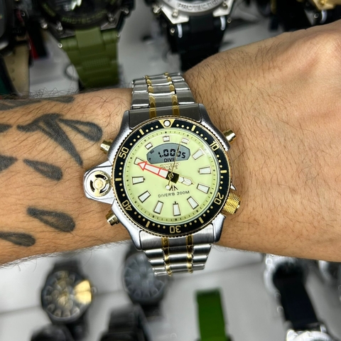 CITIZEN JP2000 - SÉRIE OURO/FUNDO VERDE CLARO/CAIXA EM AÇO/PULSEIRA DE AÇO