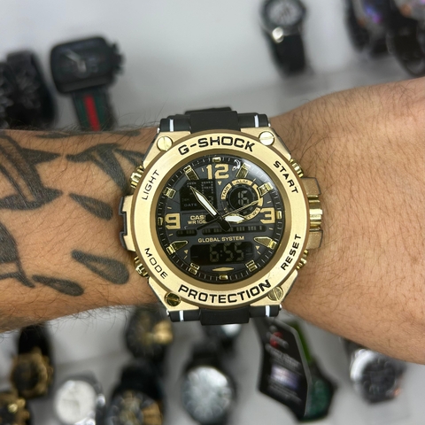 GSHOCK STEEL MODELO 1 - DOURADO/PULSEIRA DE BORRACHA/CAIXA DE AÇO/55MM