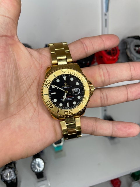 YACHT MASTER - DOURADO/FUNDO PRETO/PULSEIRA DE AÇO
