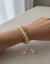Bracelete Artesanal Pérola E Dourado Energia Positiva - loja online