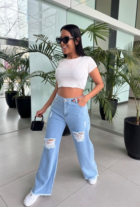 URBAN I WIDE LEG CELESTE RIGIDO CON ROTURAS Y DESFLECADO EN BOTA TIRO ALTO TALLES 36 AL 54 ANA CLARA