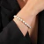 Pulseira Dourada de Pérolas e Bolinhas - comprar online