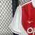 Camisa Mônaco Home 25/26 - Torcedor Masculina Branca e Vermelha - loja online