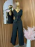 Conjunto pantalón elegante con chaleco