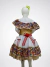 Vestido infantil amarelo floral com babados e laço vermelho - comprar online