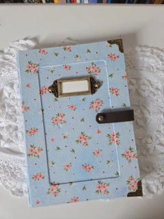 Caderno azul floral