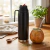 Termo 1 Litro Media Manija (Negro con Tapa Gris) - comprar online