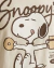 Detalle estampa remera Snoopy Foodie dona y taza licencia oficial Peanuts importada