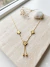 Conjunto de colar delicado e sofisticado com pingente de trevo