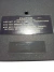 Primer plano de la carcasa trasera del juego Goal de NES donde se aprecia el grabado en bajorrelieve oficial de Nintendo y el numero de matriz de fabrica original.