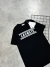 CAMISA LACOSTE TENIS ESTAMPADO NO PEITO PRETO na internet