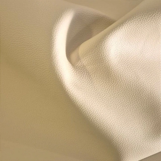 Detalhe da textura do sintético marfim e do forro em trama