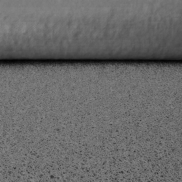 Detalhe da superfície do capacho de vinil cinza