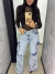 Calça jeans cargo na internet