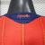 camisa-seleção-espanha-home-patch-campeão-copa-do-mundo-2026-jogador-manga-longa-adidas-cor-vermelha-th-mantos-br