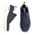 Tênis feminino slip-on na cor azul-marinho, com cabedal em tecido knit respirável e design sem cadarço. Possui solado branco robusto e macio, proporcionando leveza, conforto e praticidade para o dia a dia.
