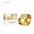Frasco dourado facetado do perfume Lady Million Rabanne ao lado da caixa branca e dourada do eau de parfum