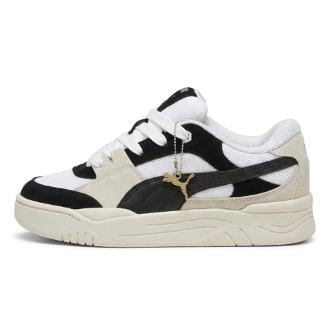 Puma 180 blanca y negra de costado