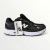 New Balance negra de costado