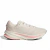Adidas Supernova blanca y rosa de costado