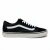 Vans clásicas negras de costado