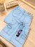 Saia Jeans Curta com Bolsos Frontais. - SAM MODAS ATACADO 