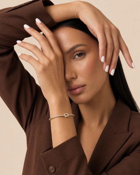 Bracelete Nó Cravejado Dourado