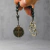 Chaveiro Dezena Hematita Com Medalha São Bento - Armazém Católico | Artigos Religiosos Católicos | Loja Católica