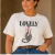 TSHIRT FEMININA ALGODÃO ONÇA LAÇO