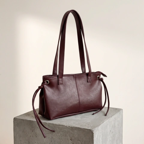 Bolso Belé Lumel bordó en ecocuero