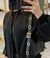 Cartera con orificios en internet