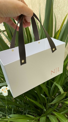 Imagem do Caixa Sacola Nadia e Luan